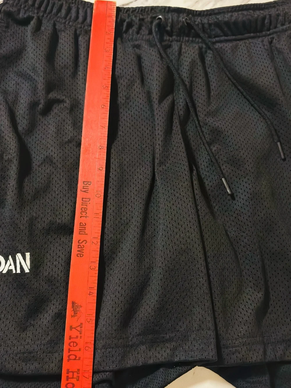 Jordan Black Athletic Mesh Shorts with Red Logo Accent